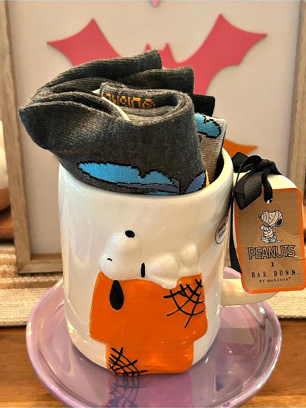 The Dunn Snoopy Mug with 2 Pair of Disney Socks.